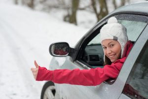 happy calgary resident driving in the snow