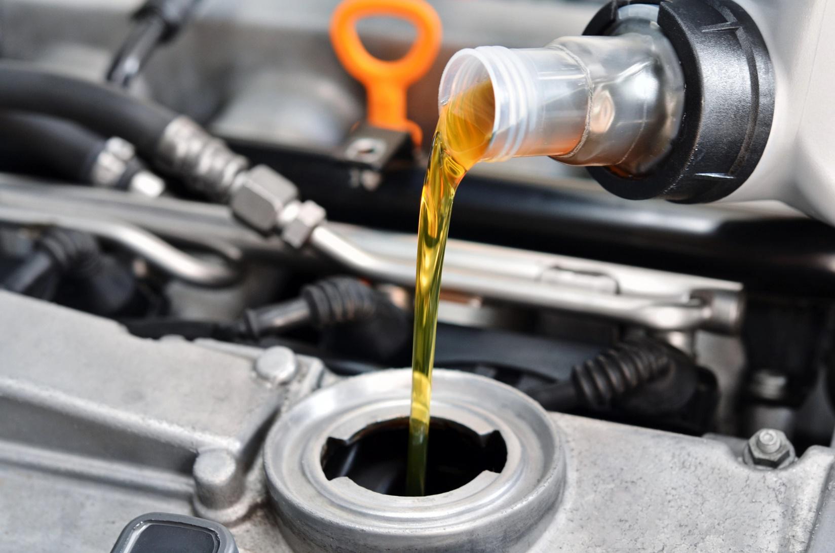 Engine Oil getting poured in engine