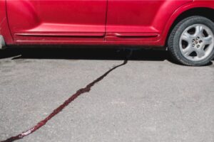 Fluid leak from a car's undercarriage.