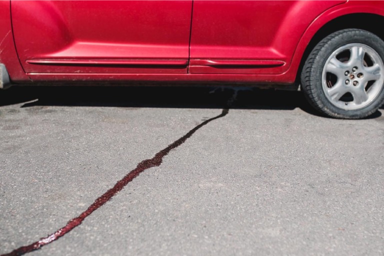 Fluid leak from a car's undercarriage.